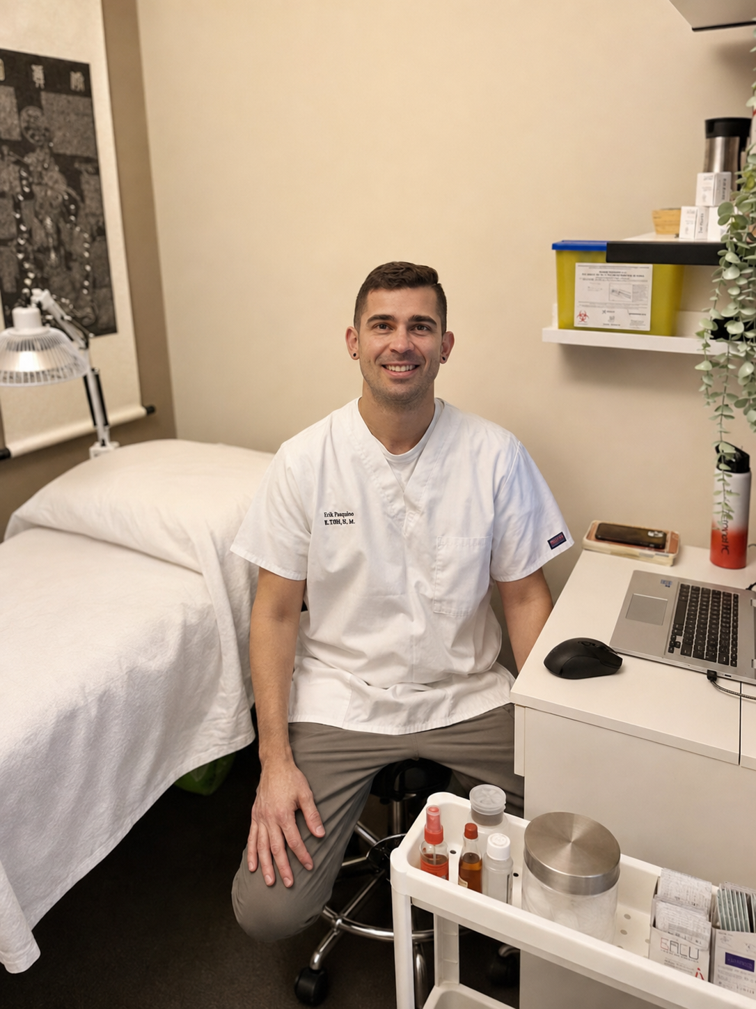 Erik Pasquino in his acupuncture treatment room in Toronto